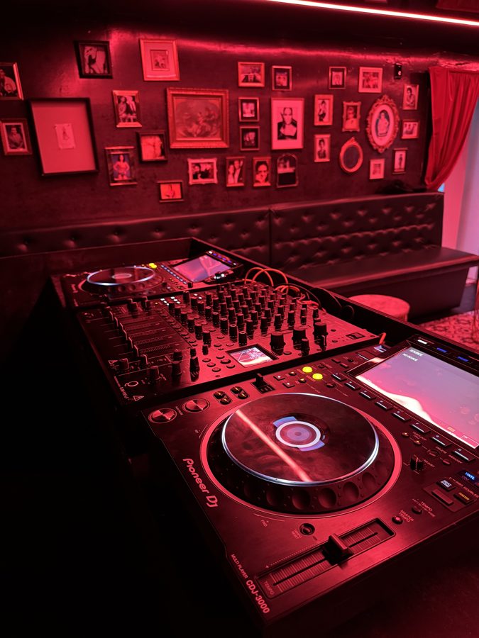 DJ booth ready for the artist under red light